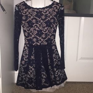 Long sleeve lace short dress.